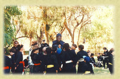 Juniors learning the etiquette of
                            swordsmanship